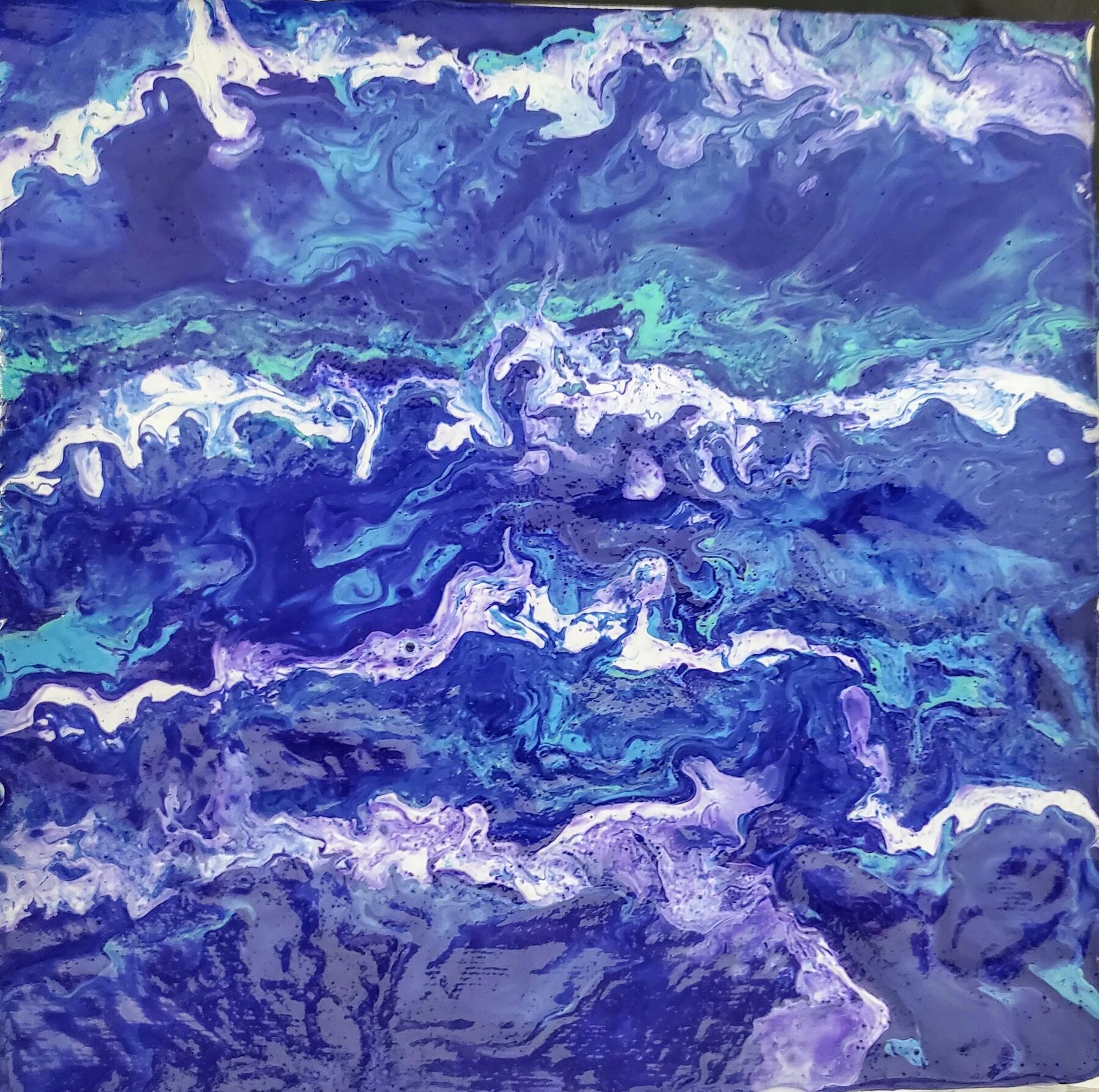Violet and white acrylic pour of open water in motion